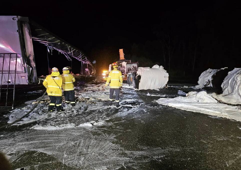 Local firefighting crews worked to extinguish the fire on the Pacific Highway, near Herons Creek. Picture, NSW RFS - Lake Cathie Brigade Facebook