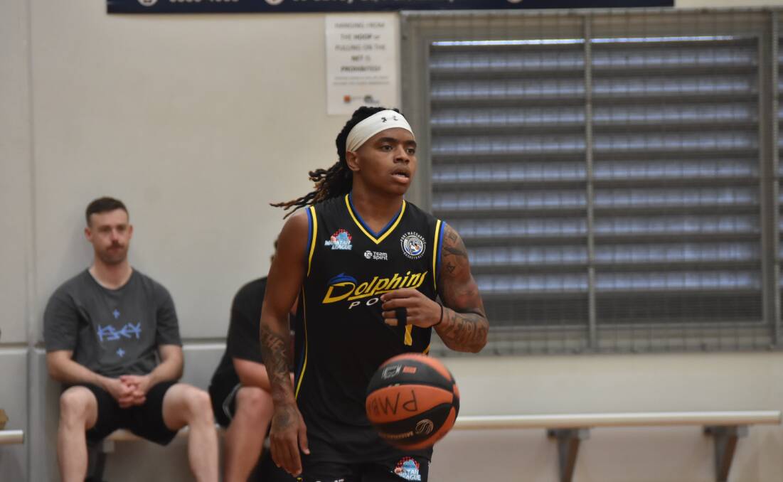 American import Kobe Powell takes the ball down the court for the Port Macquarie Dolphins in an early 2024 Waratah Basketball League clash. Picture by Emily Walker