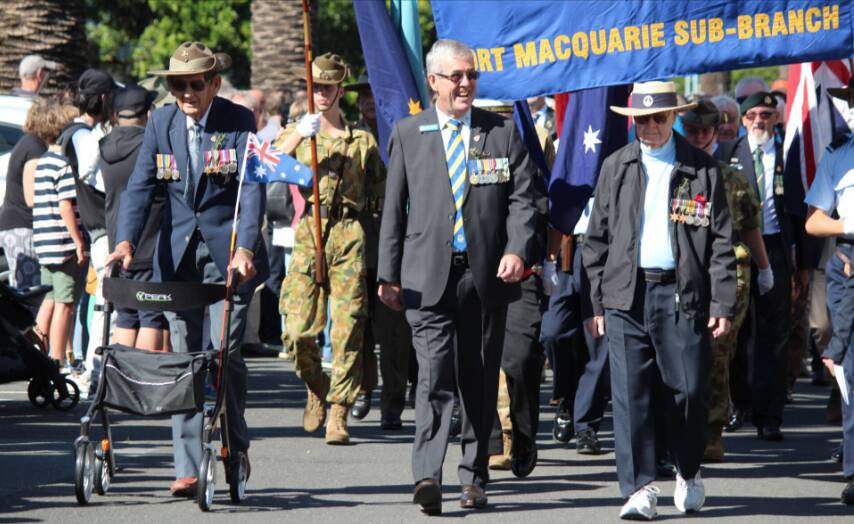 Roy Boyle (far left) leading the 2021 Port Macquarie Anzac Day march with former Port Macquarie RSL sub-branch president Greg Laird. Picture by Tracey Fairhurst