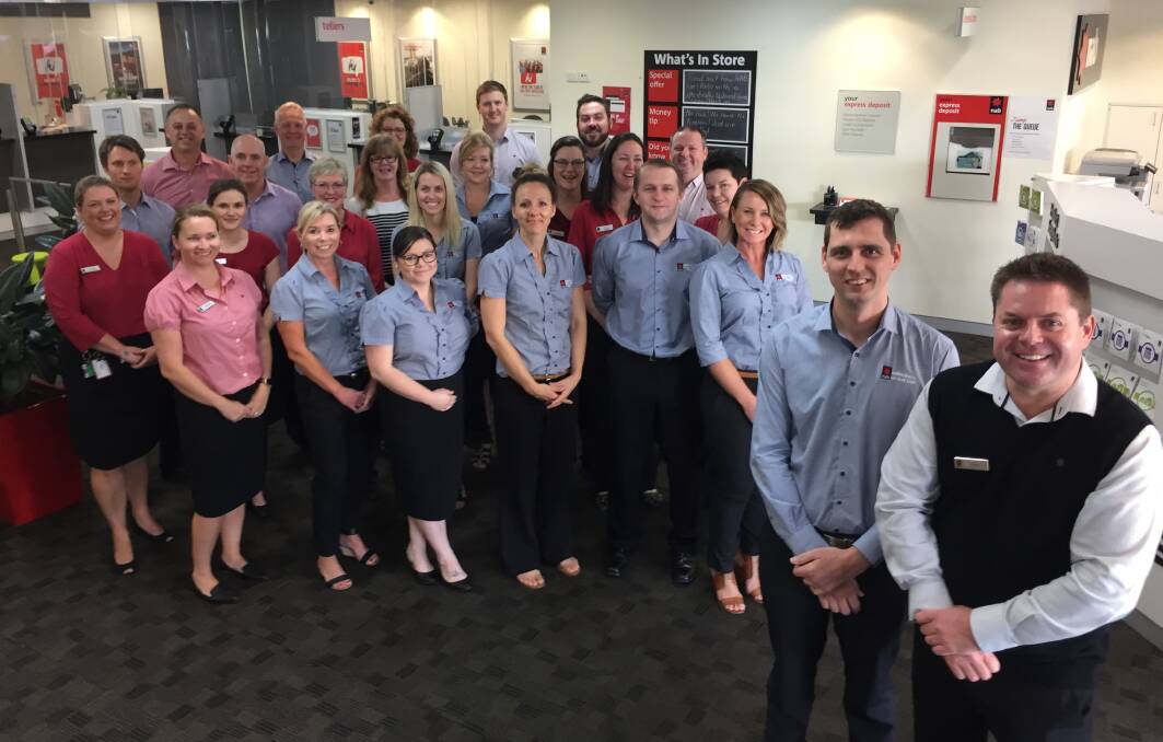 Meet the team:  The local team with Retail Manager Shane McKinnon (front right) and Business Banking Executive, Corey Beeton (front left). 