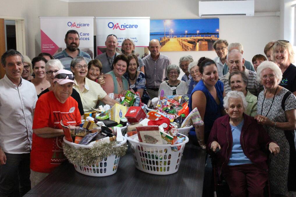 Hampers: Omnicare Alliance has donated a total of 12 Christmas hampers across the Mid-North Coast. Photo: supplied
