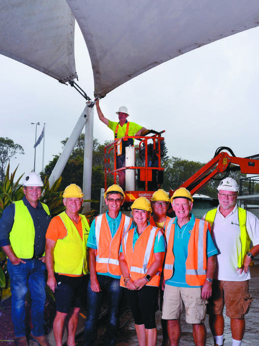 Sail donation: The Taphouse Group Facilities Manager Stewart Tonkin, Neville Ramm, Malcolm McNeil, Trish Affleck-Mooney, Paul Haynes, Neil Black of Rotary Club of Port Macquarie Sunrise  and Doug Riley Site Manager Lipman. Pic: Meraki Photograpghy