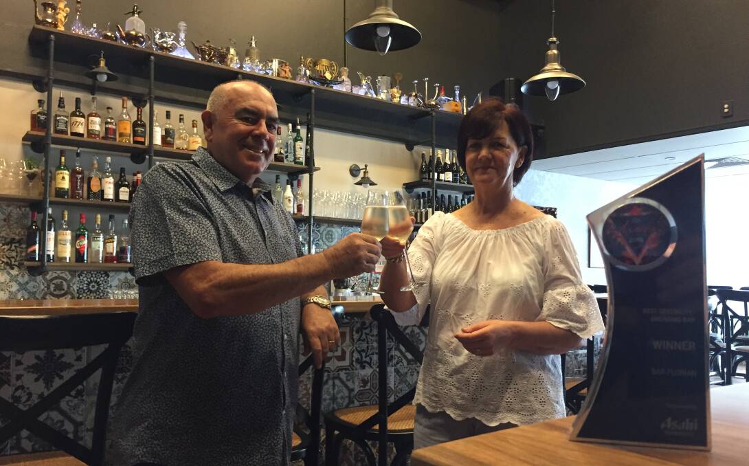 Impressive: Bar Florian owners Gino and Maree Cunial toasting their big win in the Australian Hotels Association awards.