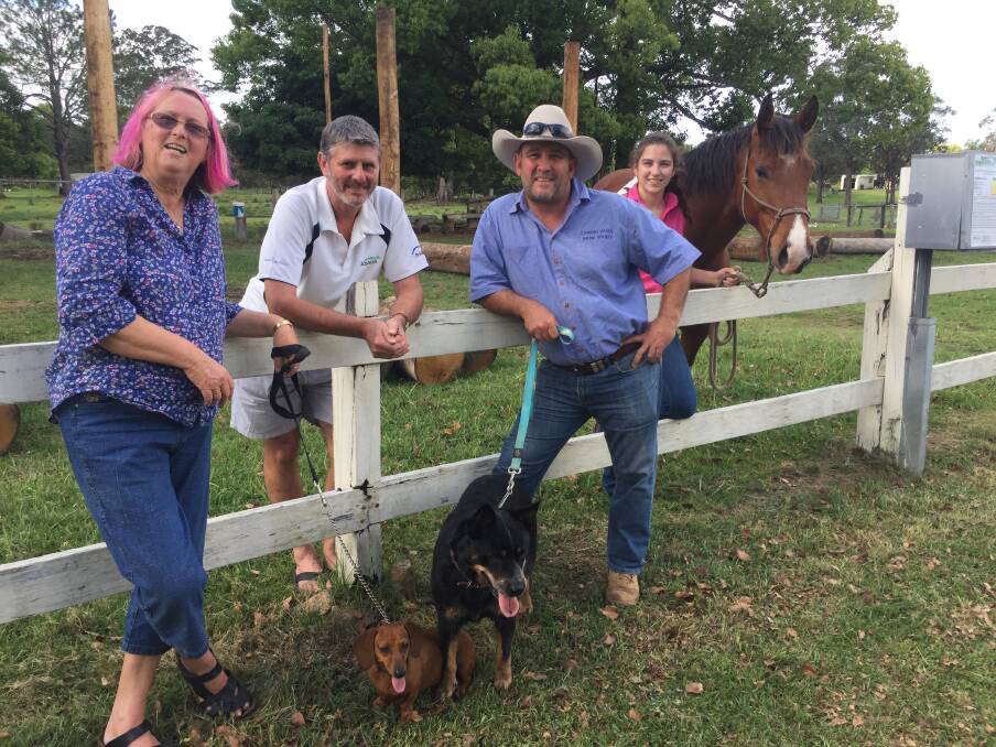 Got it covered: Kay Dollery, Allan Hudson, Sean Gleeson and Taren Gleeson ... preparing for the two day Camden Haven Show at Kendall Showground.