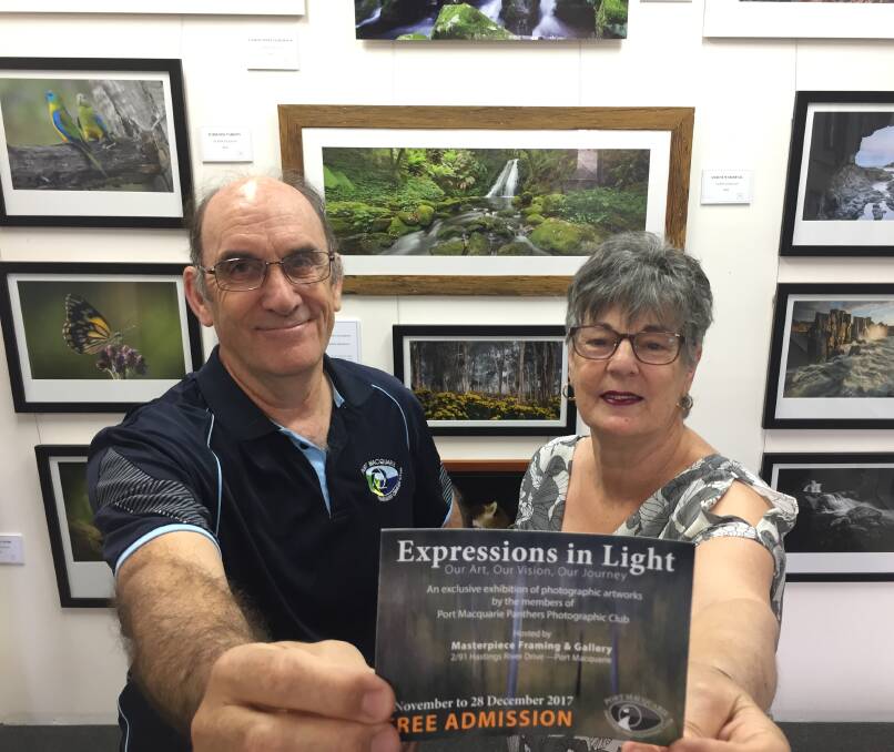 It's on: Tom Sheppard and Denise Davis promoting the Expressions In Light photographic exhibition at Masterpiece Framing and Gallery on Hastings River Drive.