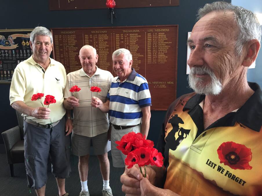 Poppies for free: Port Macquarie RSL Sub-branch secretary Gary Spencer, with president Greg Laird, vice president Kevin Lakey and treasurer Colin Clark.