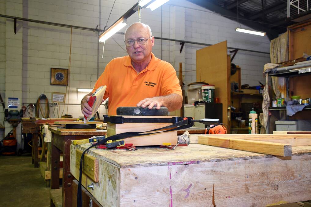 Looking forward: Port Macquarie Men's Shed member Dennis Cox working on a project. The shed members are eagerly looking forward to their new premises. Photo: Ivan Sajko