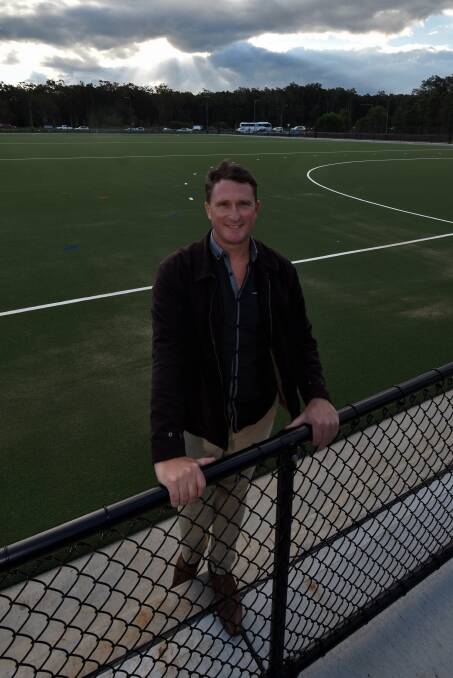 Delayed: Wet weather has hindered the works program including the second field for hockey. Hockey association president Simon Thresher is pictured at the new field. Pic: Matthew Attard 