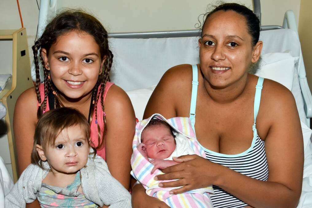 Hello Saryn: Mum Nardja with big sisters Shayla and Ava welcoming their son and brother Saryn into the world.
