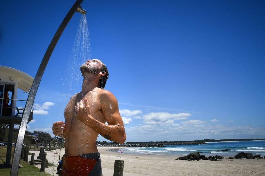 Warm weather: Antoine Martineau cooling off at Town Beach. Higher temperatures are on the way, warns weatherzone. Photo: Ivan Sajko
