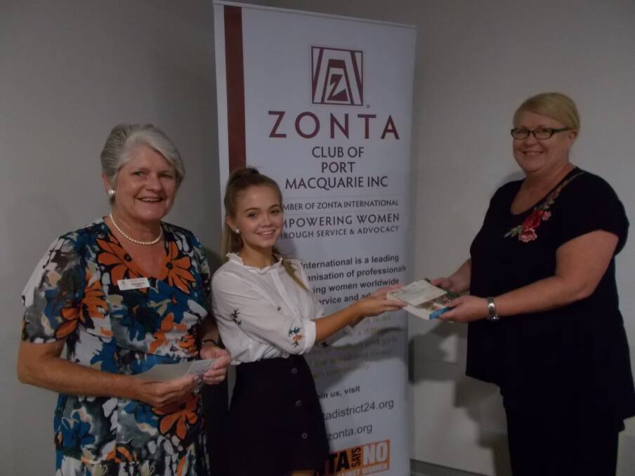 Zonta award: ​Jorga Attard receiving her award from Zonta treasurer Michelle Hogan as club president Margaret Bateman looks on. Photo: supplied