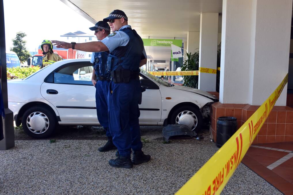 Car crash: This vehicle careened across Short Street and into the entrance to businesses on August 16.