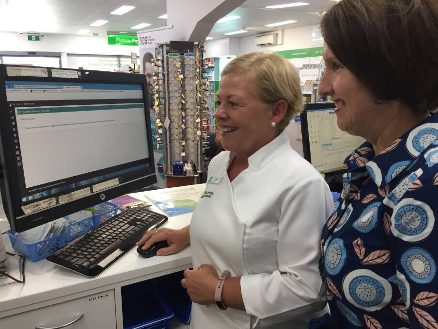 Test drive: Pharmacist Judy Plunkett and Member for Port Macquarie Leslie Williams discussing the impending removal of codeine-containing medicines from February 1.