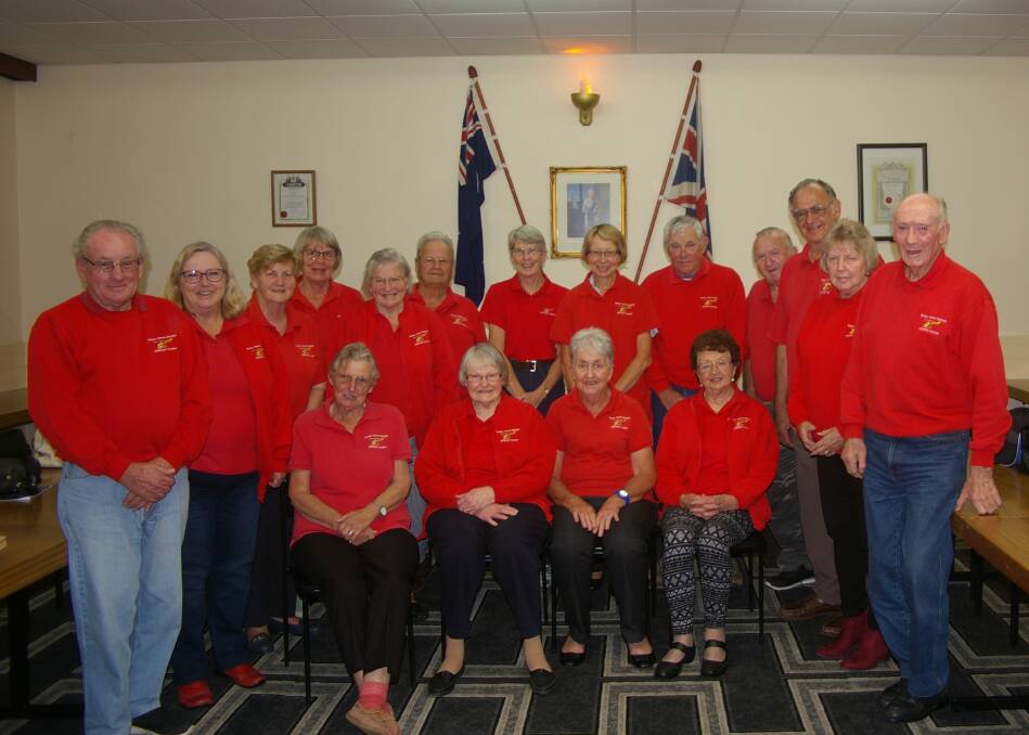 Come and join us: The Westpac Rescue Helicopter Hastings Support Group at a recent meeting. Re-elected president Bruce Cant is on the right. Photo: supplied