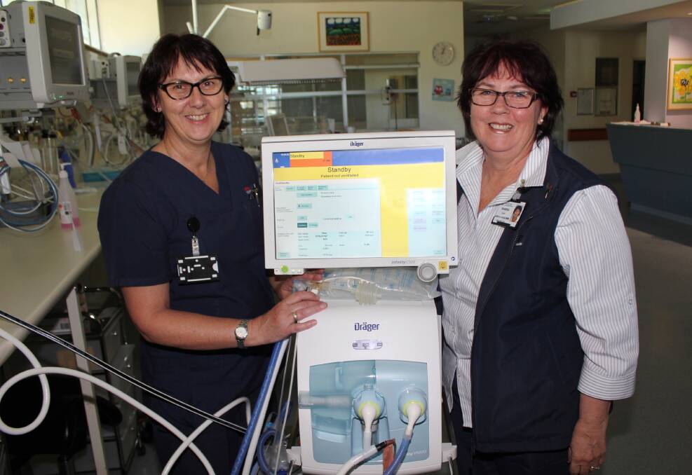 Wonderful donation: Registered Nurse and Midwife Julie Vegter and Maternity Nursing Unit Manager Sandra Eadie are all smiles thanks to the Humpty Dumpty Foundation’s donation of a neonatal ventilator .