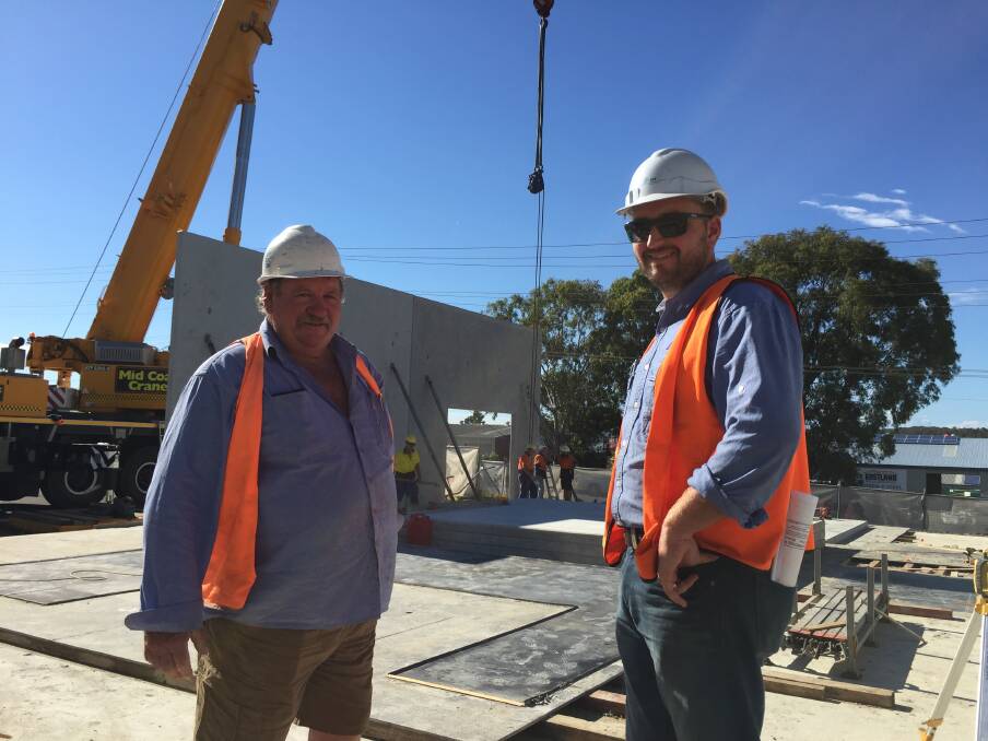 Hub centre: Andy Jung and Adam Hoitnick at the commercial hub construction site on the corner of Bolwarra and Blackbutt roads in the Port Macquarie industrial area.
