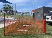 Port Macquarie-Hastings Council has put a temporary safety fence around the metal plate. Picture by Emily Walker