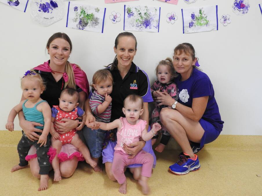 Kids and staff at TG's Childcare dressed up in purple and pink for last year's festival.