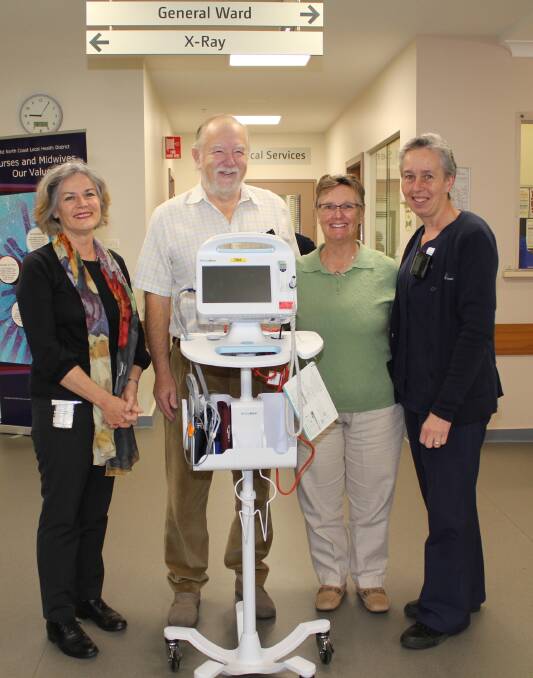 GENEROUS DONORS: Michael and Lesley Langer present a vital signs monitor to Wauchope Hospital's Ann Bodill (left) and Denise Holz (right). 