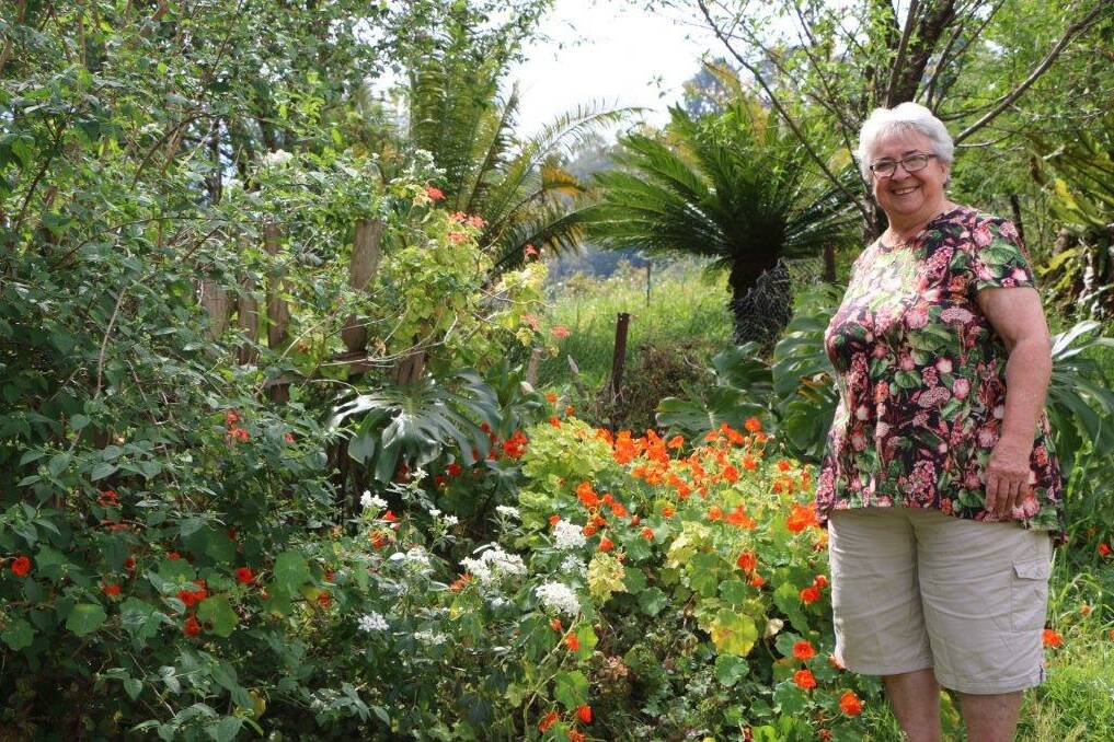 Lilah Amos in her garden at Comboyne.