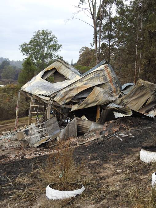 One of the houses burnt in the Pappinbarra bushfires on Sunday February 12.
