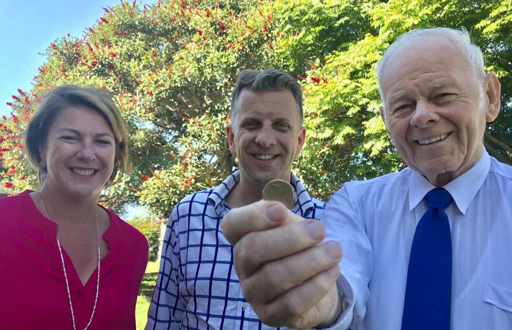 NSW ministers Melinda Pavey and Andrew Constance accept one dollar from Hastings Gateway's Ray Cooper for the peppercorn lease for the stationmaster's cottage.