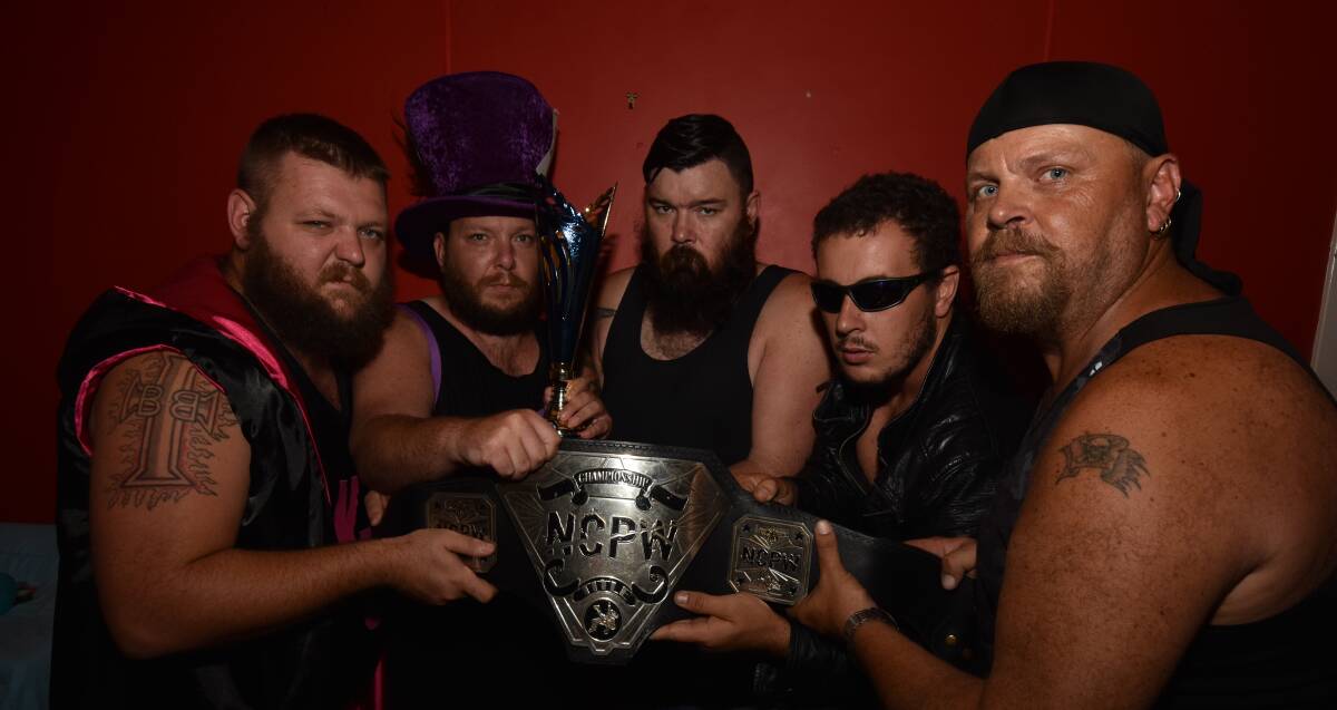Getting ready to wrestle: Curtis James, Chad Wauch, JD Wilson, Tristian Lewis and Commando all have their eyes on the prize at the big night in Wauchope RSL.