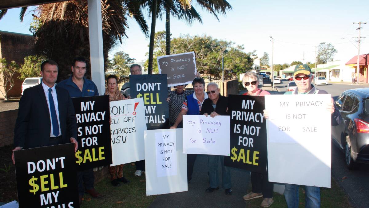 Clayton Barr MP (far left) and protestors at Wauchope Registry.