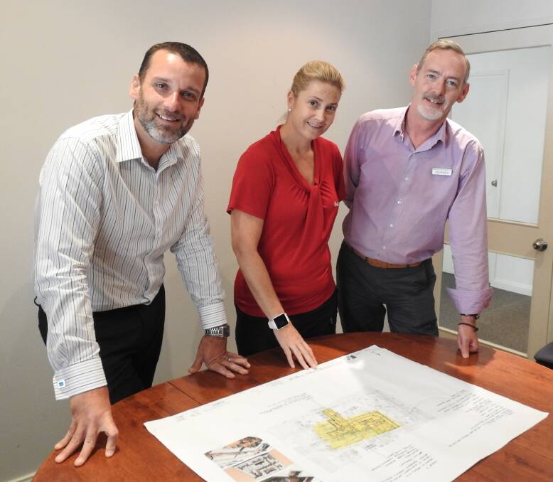 Bundaleer plans: Bundaleer CEO Gareth Norman, Operations Manager Helena Lawrie and Director of Nursing Stephen Reilly look at plans for the new home.