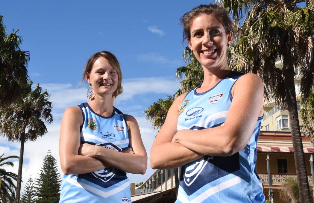 Sky blue calling: Kobie Knight and Anna Gleeson will represent NSW in the women's 35s State of Origin team. Photo: MATT McLENNAN