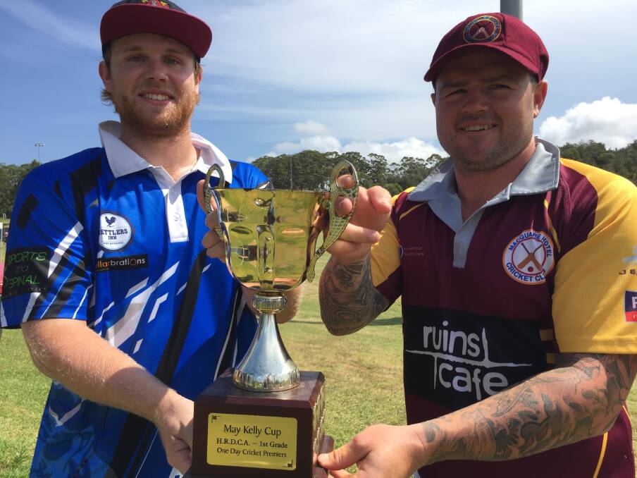 The prize: Port Pirates captain Ben Woodward and Macquarie Hotel captain Josh Hyde with the May Kelly Cup. Macquarie later won the final. Photo: Peter Daniels