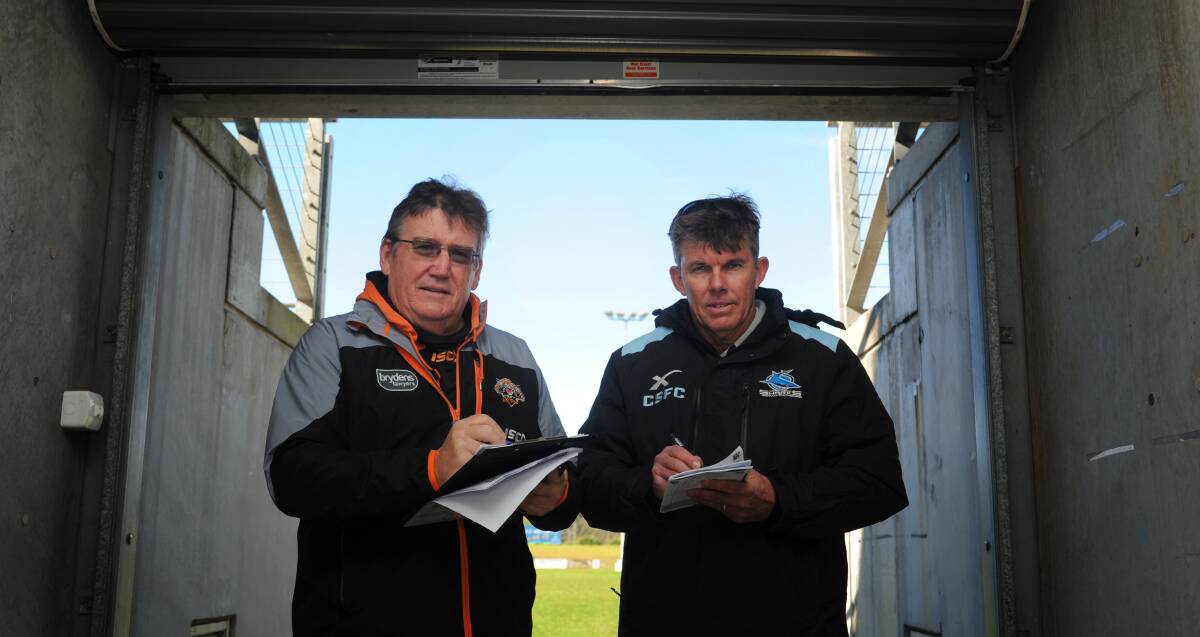 Taking notes: Wests Tigers recruitment officer Warren McDonnell and Cronulla Sharks recruitment officer Grant Jones search for the next NRL star. Photo: Ivan Sajko