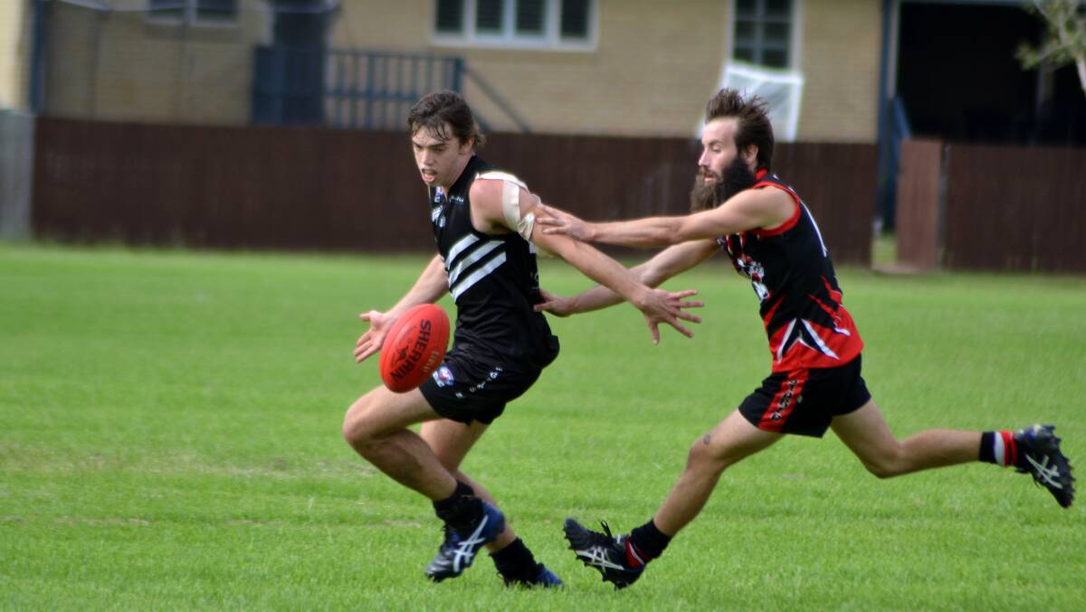 Dylan Beasley fights for the ball in the loss to Coffs Harbour. Photo: Donna Lynch