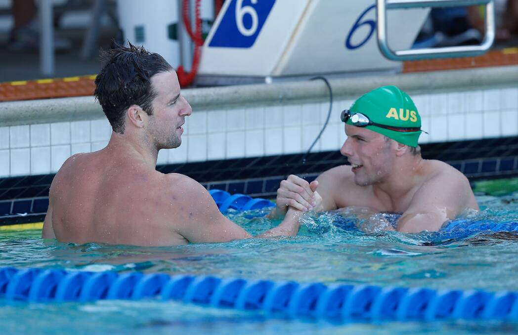 Winner: James Magnussen is congratulated by Kyle Chalmers after winning the 100m freestyle final during day three of the 2016 Arena Pro Swim Series at Santa Clara. Photo: Getty Images