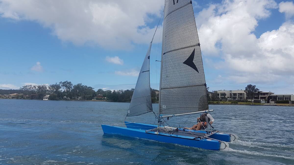Sailing along: Jack Corthals on Harpic finished second in the catamarans.