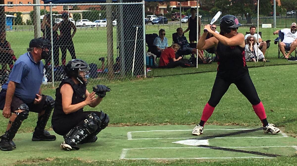 Up to the plate: Michelle Rogers batting for Warriors. Photo: supplied