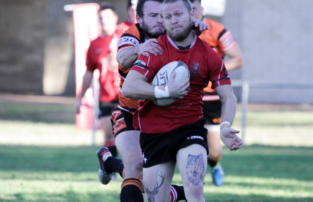 Gotcha: Eric Wilken tries to evade the Kempsey defence during their 20-15 loss on Saturday. Photo: Gaz White