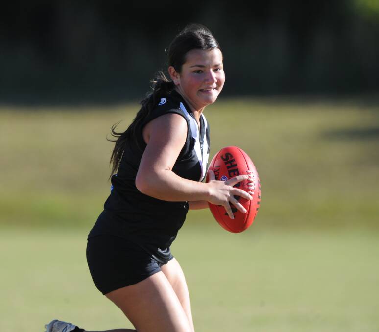 Long time coming for girls footy: Shelby Grainger in action for Port Macquarie at the 2016 girls competition trials.
