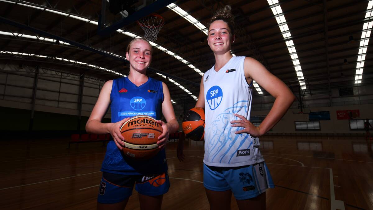 Biding their time: Port Macquarie's Maddi Baxter and Shannon Burton have been selected in the NSW Country under-16 basketball squad. Photo: Ivan Sajko