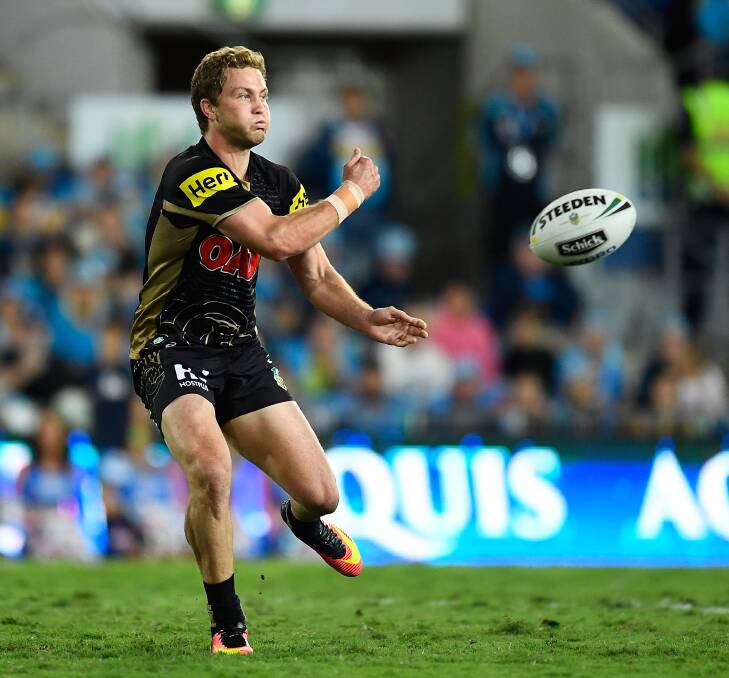 Coming to town: Matt Moylan fires a pass during the round 25 NRL match between the Gold Coast Titans and the Penrith Panthers at Cbus Super Stadium last year. Photo: Getty Images