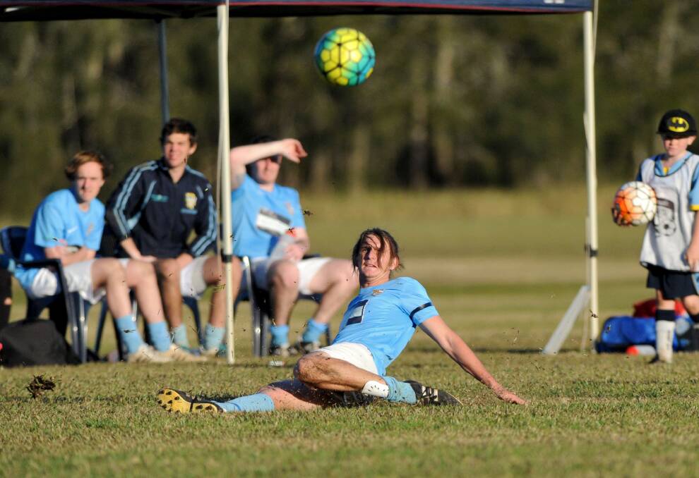 Kick and chase: Dakota Stafford clears the ball during a Port FC match last season. Photo: Ivan Sajko