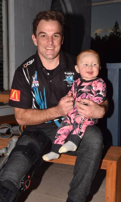 Family time: Port Sharks captain-coach Joe Cudmore said spending time with daughter Zali was a factor in his decision to retire. Photo: Ivan Sajko