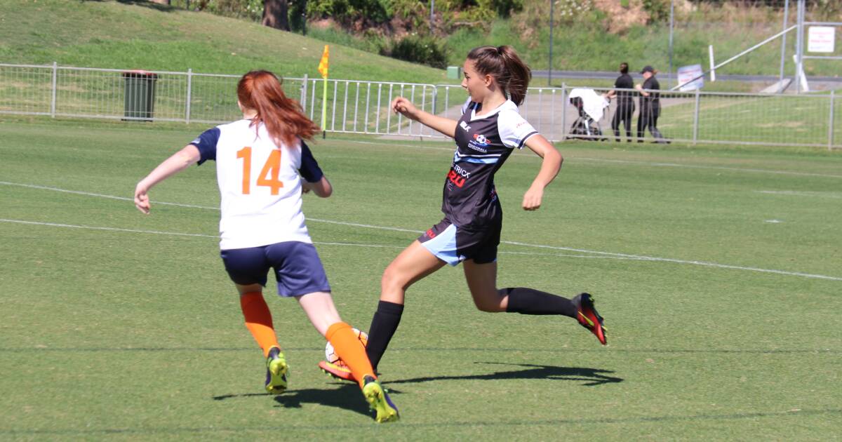 Pass and move: FMNC's under 14 Rosie Newman prepares to put boot to ball against North Coast.