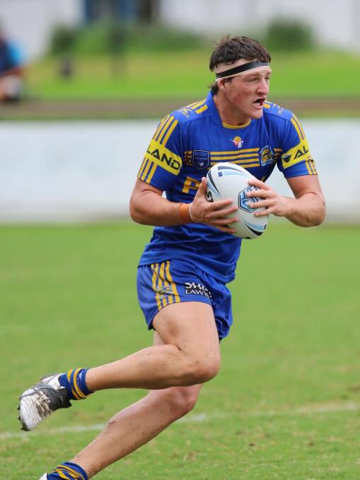 On the charge: David Hollis takes the ball up for Parramatta during this season's Harold Matthews (under-16) competition