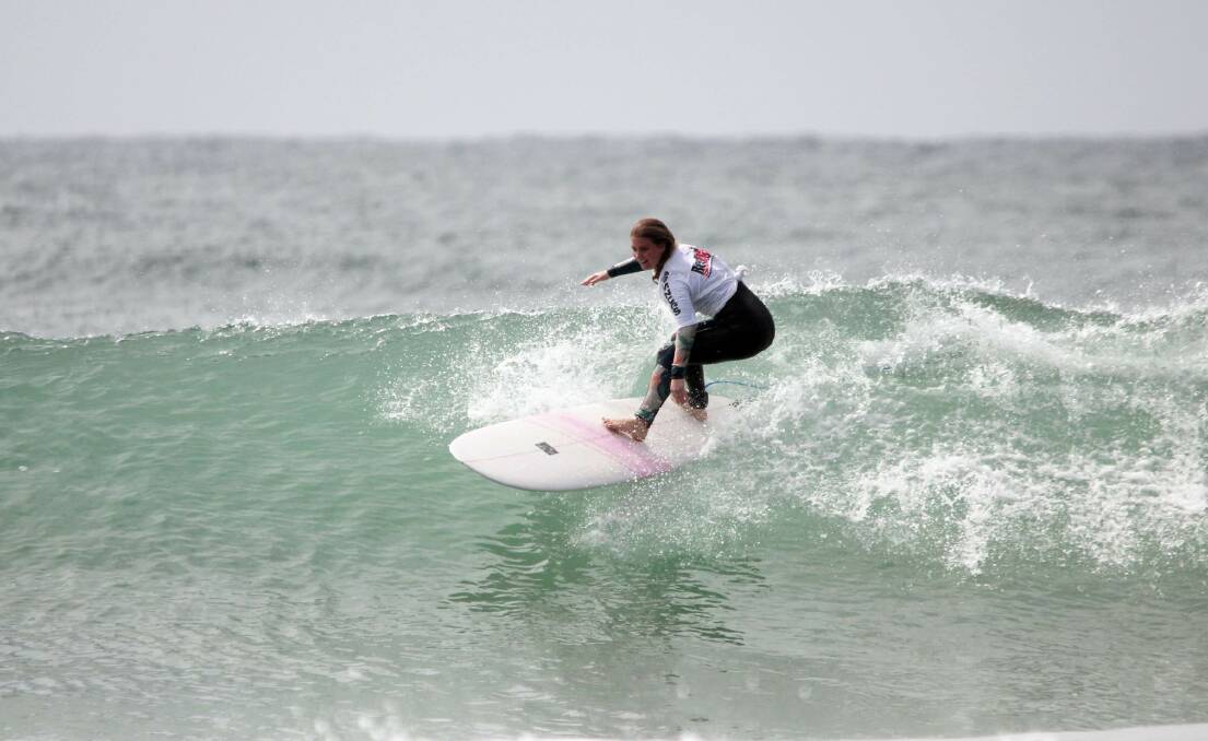 Right wave: Taree's Chelsea Green was awarded the mini Mal and open short board titles on Sunday. Photo: Tim Ettle