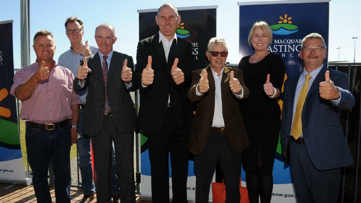 Thumbs up: Councillors Mike Cusato, Rob Turner, Justin Levido, Peter Besseling, Geoff Hawkins, council director Rebecca Olsen and general manager Craig Swift-McNair