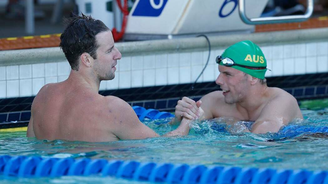 James Magnussen is congratulated by Kyle Chalmers after winning the 100m freestyle final during day three of the 2016 Arena Pro Swim Series at Santa Clara. Photo: Getty Images