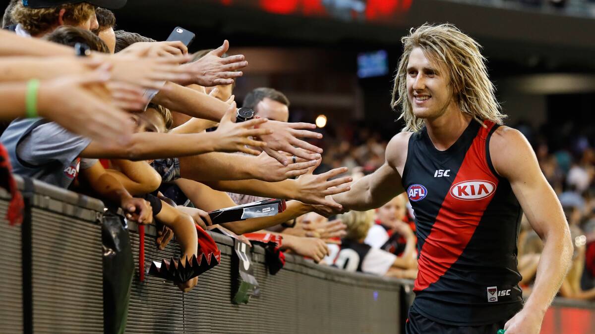 The Bombers' Dyson Heppell thanks fans after Essendeon beat the Hawks at the Melbourne Cricket Ground. Photo: Adam Trafford/AFL Media/Getty Images