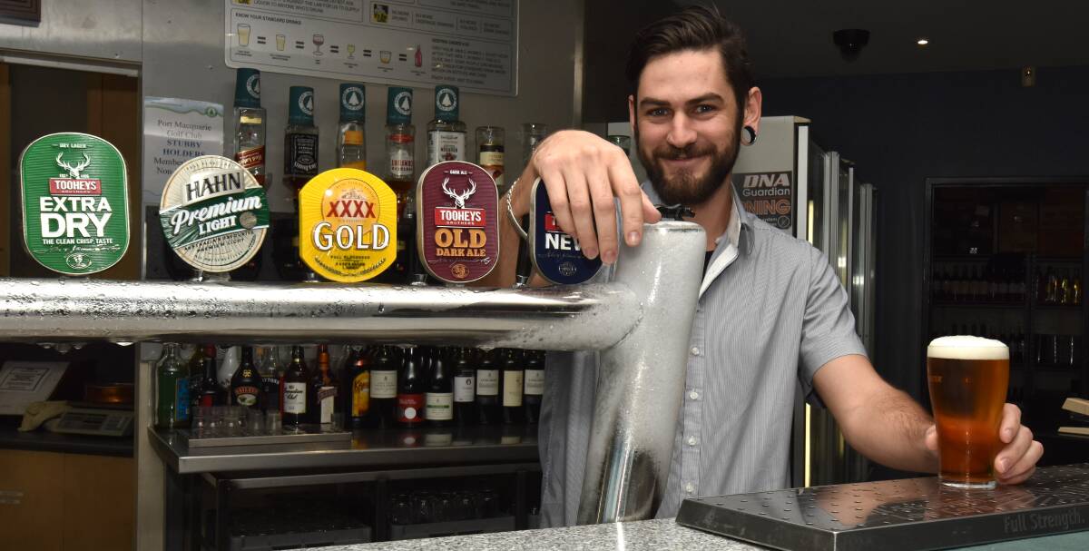 HAPPY DAYS: Port Macquarie Golf Club barman Jonathan Cook is ready to pour some ice-cold beers on International Beer Day on August 5.