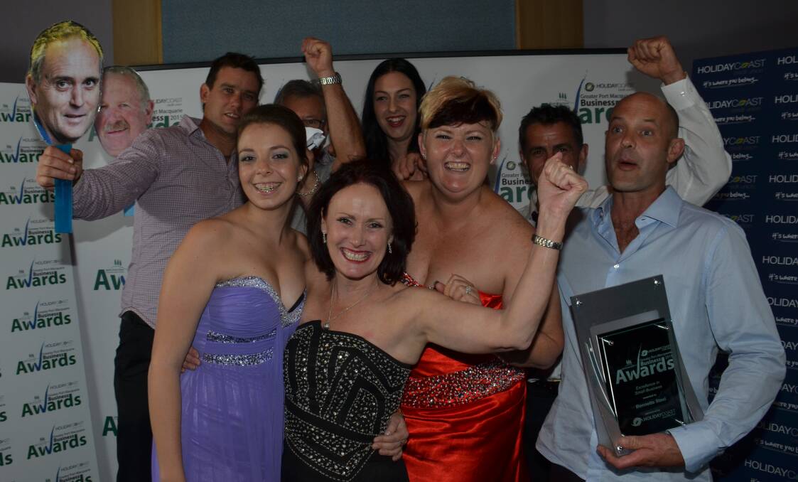 WINNERS ARE MORE THAN GRINNERS: Tanya Simmons and the Bennetts Steel team celebrate their Excellence in Small Business award win in 2015.